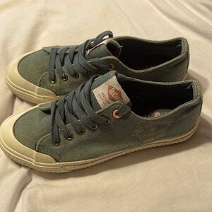 Lee Cooper London England blue jean and pink sneakers